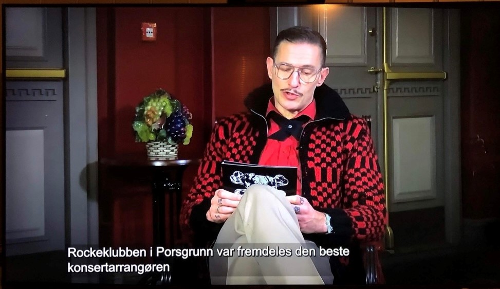 New Year's speech by Kristopher Schau, lead singer of The Dogs. It says "Rockeklubben i Porsgrunn was still the best concert organizer throughout the year"